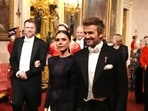 David and Victoria Beckham make their way along the East Gallery to attend the state banquet for the Emir of Qatar Sheikh Tamim bin Hamad Al Thani at Buckingham Palace, during his state visit to the UK, London, Britain, December 3, 2024.  