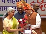 Mumbai: Union Finance Minister Nirmala Sitharaman felicitates BJP leader Devendra Fadnavis after he was unanimously elected as the Maharashtra BJP legislature party leader. Mumbai: Union Finance Minister Nirmala Sitharaman felicitates BJP leader Devendra Fadnavis after he was unanimously elected as the Maharashtra BJP legislature party leader.