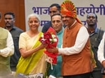 Mumbai: BJP's central observers Nirmala Sitharaman and Vijay Rupani with party leaders Vinod Tawde and Chandrashekhar Bawankule felicitate party leader Devendra Fadnavis after the BJP legislature meeting, at Vidhan Bhavan, in Mumbai, Mumbai: BJP's central observers Nirmala Sitharaman and Vijay Rupani with party leaders Vinod Tawde and Chandrashekhar Bawankule felicitate party leader Devendra Fadnavis after the BJP legislature meeting, at Vidhan Bhavan, in Mumbai,