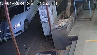 A video grab shows the motorcyclist on the bonnet of the Audi. The car allegedly dragged the 23-year-old for over three kilometres in Chinchwad on Sunday, officials said on Tuesday (HT) A video grab shows the motorcyclist on the bonnet of the Audi. The car allegedly dragged the 23-year-old for over three kilometres in Chinchwad on Sunday, officials said on Tuesday (HT)