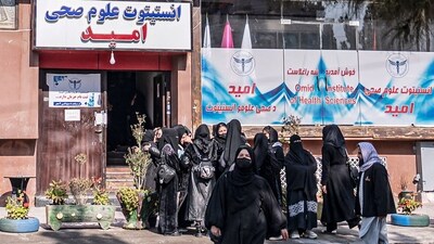 Afghan female students studying health studies gather outside the Omid Institute of Health Sciences in Kabul on December 3, 2024. (AFP) Afghan female students studying health studies gather outside the Omid Institute of Health Sciences in Kabul on December 3, 2024. (AFP)