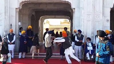 Amritsar, Dec 04 (ANI): An assassination attempt was made on Former Punjab Deputy Chief Minister Sukhbir Singh Badal at Golden Temple premises while offering 'seva' under the religious punishments pronounced for them by Sri Akal Takht Sahib, on 2nd December, in Amritsar on Wednesday. (ANI) Amritsar, Dec 04 (ANI): An assassination attempt was made on Former Punjab Deputy Chief Minister Sukhbir Singh Badal at Golden Temple premises while offering 'seva' under the religious punishments pronounced for them by Sri Akal Takht Sahib, on 2nd December, in Amritsar on Wednesday. (ANI)