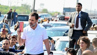 Leader of Opposition in Lok Sabha Rahul Gandhi displays a copy of the Constitution of India to the media after being stopped by the police at the Ghazipur border. (ANI) Leader of Opposition in Lok Sabha Rahul Gandhi displays a copy of the Constitution of India to the media after being stopped by the police at the Ghazipur border. (ANI)