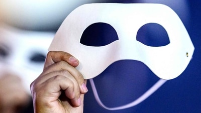  Activists hold eye masks during a protest in Seoul. (AFP) Activists hold eye masks during a protest in Seoul. (AFP)