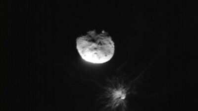 (FILES) (FILES) This handout picture obtained by the Italian Space Agency�s LICIACube shows NASA's Double Asteroid Redirection Test (DART) mission just before its closest approach to the Dimorphos asteroid, on September 26, 2022.. (Photo by Handout / ASI/NASA / AFP) / (AFP) (FILES) (FILES) This handout picture obtained by the Italian Space Agency�s LICIACube shows NASA's Double Asteroid Redirection Test (DART) mission just before its closest approach to the Dimorphos asteroid, on September 26, 2022.. (Photo by Handout / ASI/NASA / AFP) / (AFP)