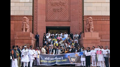 INDIA bloc MPs protest over the Adani issue at the Parliament in New Delhi on Wednesday. (ANI) INDIA bloc MPs protest over the Adani issue at the Parliament in New Delhi on Wednesday. (ANI)