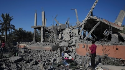 Palestinians check the rubble of a destroyed building following an overnight Israeli strike in Deir al-Balah, Gaza Strip, Wednesday, Dec. 4, 2024. (AP) Palestinians check the rubble of a destroyed building following an overnight Israeli strike in Deir al-Balah, Gaza Strip, Wednesday, Dec. 4, 2024. (AP)
