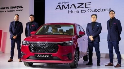 From left, Vice President of Marketing and Sales of the Honda Cars India Ltd. Kunal Behl, the company's President and CEO Takuya Tsumura, the company's Marketing and Sales Director Ryuto Shimizu, and Product Development Team representative for the All-New Amaze from Honda R&D Asia Pacific Peerachet T at the global debut of the All-New 3rd Generation Honda Amaze, in New Delhi, Wednesday, Dec. 4, 2024 (Arun Sharma/PTI) From left, Vice President of Marketing and Sales of the Honda Cars India Ltd. Kunal Behl, the company's President and CEO Takuya Tsumura, the company's Marketing and Sales Director Ryuto Shimizu, and Product Development Team representative for the All-New Amaze from Honda R&D Asia Pacific Peerachet T at the global debut of the All-New 3rd Generation Honda Amaze, in New Delhi, Wednesday, Dec. 4, 2024 (Arun Sharma/PTI)