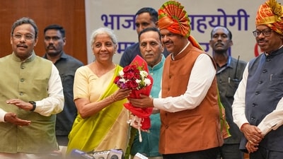 Mumbai: BJP's central observers Nirmala Sitharaman and Vijay Rupani with party leaders Vinod Tawde and Chandrashekhar Bawankule felicitate party leader Devendra Fadnavis after the BJP legislature meeting, at Vidhan Bhavan, in Mumbai, (PTI) Mumbai: BJP's central observers Nirmala Sitharaman and Vijay Rupani with party leaders Vinod Tawde and Chandrashekhar Bawankule felicitate party leader Devendra Fadnavis after the BJP legislature meeting, at Vidhan Bhavan, in Mumbai, (PTI)