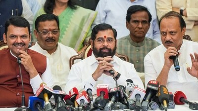 Mumbai: Shiv Sena chief Eknath Shinde with BJP leader Devendra Fadnavis and NCP chief Ajit Pawar during a press conference. (PTI) Mumbai: Shiv Sena chief Eknath Shinde with BJP leader Devendra Fadnavis and NCP chief Ajit Pawar during a press conference. (PTI)
