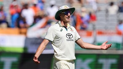 Pat Cummins gestures in the field on the third day of the first cricket Test between Australia and India in Perth. (AP) Pat Cummins gestures in the field on the third day of the first cricket Test between Australia and India in Perth. (AP)