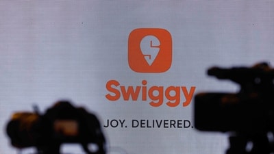 The Swiggy Limited's logo is seen at a press conference during which its Initial Public Offering (IPO) was announced in Mumbai, India, October 30, 2024 (Francis Mascarenhas/Reuters)