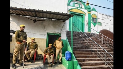 State police personnel deployed outside the Shahi Jama Masjid following religious violence in Sambhal on November 25, 2024. (Photo by AFP) (AFP) State police personnel deployed outside the Shahi Jama Masjid following religious violence in Sambhal on November 25, 2024. (Photo by AFP) (AFP)
