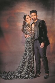 Rakul’s outfit: Kaynaat by Aanchal Sawhney
Jewellery: Akoya Jewels
Jackky’s outfit: Amaare
Rakul dazzles in a hand-embroidered mermaid skirt with a sheer top from Kaynaat by Aanchal Sawhney, paired with rose-cut diamond chandelier earrings from Akoya. Jackky stuns in a paisley tuxedo with 3D lapel and dabka work by Amaare (Photo: Tejas Nerurkar) Rakul’s outfit: Kaynaat by Aanchal Sawhney
Jewellery: Akoya Jewels
Jackky’s outfit: Amaare
Rakul dazzles in a hand-embroidered mermaid skirt with a sheer top from Kaynaat by Aanchal Sawhney, paired with rose-cut diamond chandelier earrings from Akoya. Jackky stuns in a paisley tuxedo with 3D lapel and dabka work by Amaare (Photo: Tejas Nerurkar)