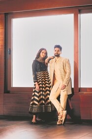 Rakul’s outfit: W for Woman
Jackky’s outfit: Amaare
Jewellery: Kays Jewels
Footwear: Kurrbat
Rakul embraces elegance in a black chevron anarkali, complemented by statement jewellery from Kays Jewels and juttis from Kurrbat. Jackky impresses in a regal achkan with matching kurta and pants by Amaare (Photo: Tejas Nerurkar) Rakul’s outfit: W for Woman
Jackky’s outfit: Amaare
Jewellery: Kays Jewels
Footwear: Kurrbat
Rakul embraces elegance in a black chevron anarkali, complemented by statement jewellery from Kays Jewels and juttis from Kurrbat. Jackky impresses in a regal achkan with matching kurta and pants by Amaare (Photo: Tejas Nerurkar)