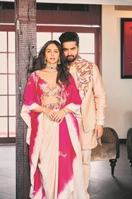 Rakul and Jacky’s outfit: Rishi & Soujit
Jewellery: Kays Jewels
Rakul radiates charm in a draped silk skirt and ombre cape paired with a geometric embroidered bustier by Rishi & Soujit, completed with diamond jewellery from Kays Jewels. Jackky keeps it classy in an off-white chanderi kurta with an embroidered bundi (Photo: Tejas Nerurkar) Rakul and Jacky’s outfit: Rishi & Soujit
Jewellery: Kays Jewels
Rakul radiates charm in a draped silk skirt and ombre cape paired with a geometric embroidered bustier by Rishi & Soujit, completed with diamond jewellery from Kays Jewels. Jackky keeps it classy in an off-white chanderi kurta with an embroidered bundi (Photo: Tejas Nerurkar)