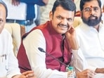 BJP leader Devendra Fadnavis with Shive Sena chief Eknath Shinde and NCP chief Ajit Pawar at the Raj Bhavan to stake claim for forming the government in Maharashtra. (PTI) BJP leader Devendra Fadnavis with Shive Sena chief Eknath Shinde and NCP chief Ajit Pawar at the Raj Bhavan to stake claim for forming the government in Maharashtra. (PTI)