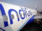 The side of an IndiGo Airlines A320 aircraft is pictured on the tarmac 