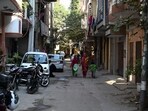 A view of the street in Devali, under the jurisdiction of the Neb Sarai Police Station, where a triple murder occurred on Wednesday, December 4, 2024 A view of the street in Devali, under the jurisdiction of the Neb Sarai Police Station, where a triple murder occurred on Wednesday, December 4, 2024