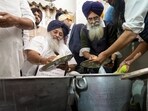 Shiromani Akali Dal leader Sukhbir Singh Badal serves his Tankhah (religious punishment) at the Golden Temple on Wednesday Shiromani Akali Dal leader Sukhbir Singh Badal serves his Tankhah (religious punishment) at the Golden Temple on Wednesday