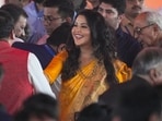 BJP leader Devendra Fadnavis' wife Amruta Fadnavis during her husband's swearing-in ceremony as Maharashtra Chief Minister, in Mumbai,