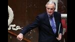 TOPSHOT - French Prime Minister Michel Barnier leaves after delivering a speech during the debate prior to the no-confidence votes on his administration at the National Assembly in Paris on December 4, 2024. The French National Assembly debates two motions brought by the French left-wing Nouveau Front Populaire (New Popular Front) NFP coalition and the French far-right Rassemblement National (National Rally) RN party in a standoff over 2025's austerity budget, which saw French Prime Minister force through a social security financing bill without a vote (article 49.3) on December 2, 2024. (Photo by Alain JOCARD / AFP) (AFP)