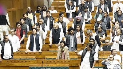 Opposition MPs raise slogans in the Lok Sabha during the Winter Session of Parliament, in New Delhi on Wednesday. (Sansad TV/ ANI) Opposition MPs raise slogans in the Lok Sabha during the Winter Session of Parliament, in New Delhi on Wednesday. (Sansad TV/ ANI)