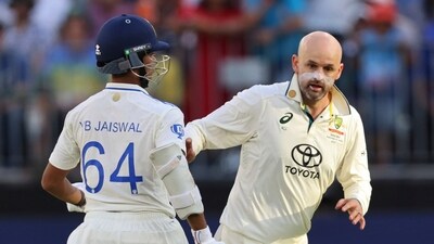 Australia's Nathan Lyon collides with India's Yashasvi Jaiswal as he runs to field (AP) Australia's Nathan Lyon collides with India's Yashasvi Jaiswal as he runs to field (AP)