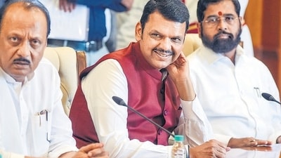 BJP leader Devendra Fadnavis with Shive Sena chief Eknath Shinde and NCP chief Ajit Pawar at the Raj Bhavan to stake claim for forming the government in Maharashtra. (PTI)