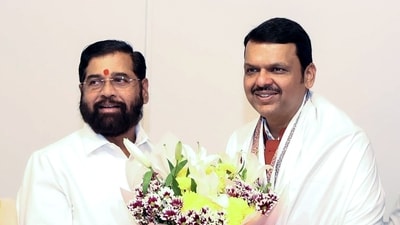 Shiv Sena chief Eknath Shinde greets BJP leader Devendra Fadnavis as he is elected as Maharashtra BJP Legislative Party leader. (ANI) Shiv Sena chief Eknath Shinde greets BJP leader Devendra Fadnavis as he is elected as Maharashtra BJP Legislative Party leader. (ANI)