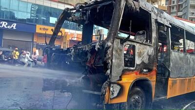 Fifteen students onboard a school bus narrowly escaped after the vehicle caught fire near Mountain Glory Society at Tulja Bhavaninagar locality in Kharadi Thursday afternoon. (HT)