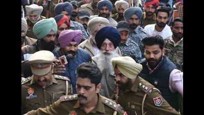 Former militant Narain Singh Chaura who made attempt to assassinate former deputy CM and SAD leader Sukhbir Singh Badal at the entrance of Golden Temple on Wednesday, being produced in a local court in Amritsar on Thursday. (Sameer Sehgal/HT) Former militant Narain Singh Chaura who made attempt to assassinate former deputy CM and SAD leader Sukhbir Singh Badal at the entrance of Golden Temple on Wednesday, being produced in a local court in Amritsar on Thursday. (Sameer Sehgal/HT)