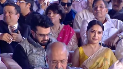 Manish Paul kept her company during the ceremony where Devendra took the oath as the next chief minister of the state. Manish Paul kept her company during the ceremony where Devendra took the oath as the next chief minister of the state.