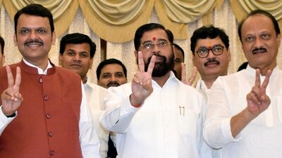 Shiv Sena chief Eknath Shinde, BJP leader Devendra Fadnavis and NCP chief Ajit Pawar show victory signs after staking claim to form the government in Maharashtra, at Raj Bhawan in Mumbai on Wednesday. (ANI) Shiv Sena chief Eknath Shinde, BJP leader Devendra Fadnavis and NCP chief Ajit Pawar show victory signs after staking claim to form the government in Maharashtra, at Raj Bhawan in Mumbai on Wednesday. (ANI)