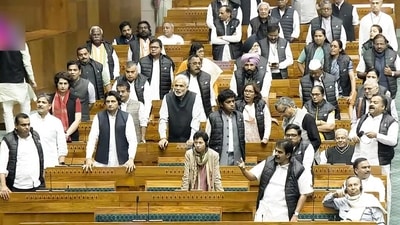 Opposition MPs raise slogans in the Lok Sabha during the Winter Session of Parliament, in New Delhi on Wednesday. (ANI PHOTO) Opposition MPs raise slogans in the Lok Sabha during the Winter Session of Parliament, in New Delhi on Wednesday. (ANI PHOTO)
