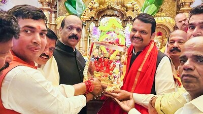 Maharashtra Chief Minister-designate Devendra Fadnavis visited the Siddhivinayak temple in Mumbai on Thursday and sought blessings before the swearing-in ceremony. (PTI) Maharashtra Chief Minister-designate Devendra Fadnavis visited the Siddhivinayak temple in Mumbai on Thursday and sought blessings before the swearing-in ceremony. (PTI)