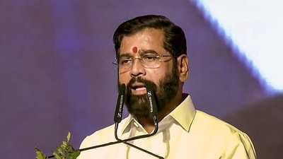 Shiv Sena leader Eknath Shinde takes oath as Maharashtra Deputy Chief Minister during the swearing-in ceremony, in Mumbai, (PTI) Shiv Sena leader Eknath Shinde takes oath as Maharashtra Deputy Chief Minister during the swearing-in ceremony, in Mumbai, (PTI)