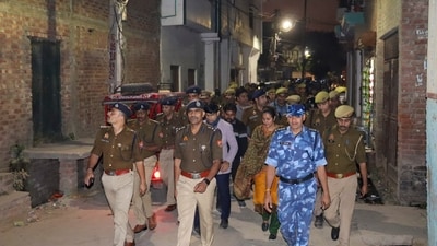 Sambhal: Police and security personnel during a flag march ahead of Friday prayers near the Shahi Jama Masjid. (PTI) Sambhal: Police and security personnel during a flag march ahead of Friday prayers near the Shahi Jama Masjid. (PTI)