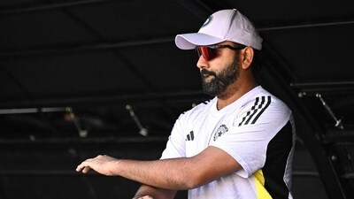 Rohit Sharma looks on from the pavilion on day four of the first Test against Australia in Perth. (AFP) (HT_PRINT) Rohit Sharma looks on from the pavilion on day four of the first Test against Australia in Perth. (AFP) (HT_PRINT)