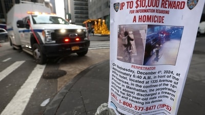 A poster is attached to a lamp post outside the Hilton hotel near the scene where the CEO of UnitedHealthcare Brian Thompson was shot dead in Midtown Manhattan, in New York City, U.S., December 5, 2024. REUTERS/Mike Segar (REUTERS)