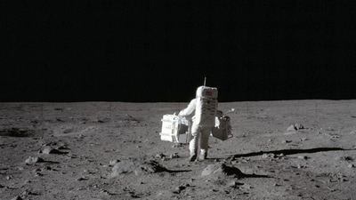 In this July 20, 1969 photo made available by NASA, lunar module pilot Buzz Aldrin carries a seismic experiments package in his left hand and the Laser Ranging Retroreflector to the deployment area on the surface of the moon at Tranquility Base. On Tuesday, Oct. 13, 2020, NASA released a set of guidelines for its Artemis moon-landing program, based on the 1967 Outer Space Treaty and other agreements. (AP) In this July 20, 1969 photo made available by NASA, lunar module pilot Buzz Aldrin carries a seismic experiments package in his left hand and the Laser Ranging Retroreflector to the deployment area on the surface of the moon at Tranquility Base. On Tuesday, Oct. 13, 2020, NASA released a set of guidelines for its Artemis moon-landing program, based on the 1967 Outer Space Treaty and other agreements. (AP)