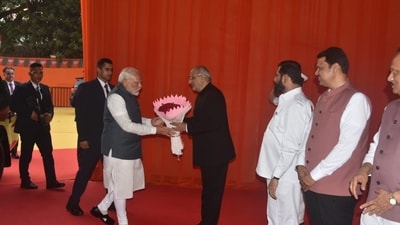 The oath was administered by governor CP Radhakrishnan, with Prime Minister Narendra Modi, union home minister Amit Shah and defence minister Rajnath Singh present as well. (Yogesh Naik/ Hindustan Times) The oath was administered by governor CP Radhakrishnan, with Prime Minister Narendra Modi, union home minister Amit Shah and defence minister Rajnath Singh present as well. (Yogesh Naik/ Hindustan Times)
