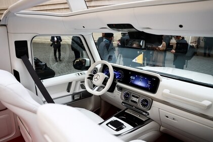A photographer takes a picture of the interior of a new open popemobile on the day it's received by Pope Francis at the Vatican, December 4, 2024. REUTERS/Yara Nardi (REUTERS)