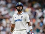 India's Virat Kohli reacts as he walks off the field after losing his wicket during day one of the second cricket test match against Australia