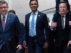 Speaker of the House Mike Johnson walks with Vivek Ramaswamy and Elon Musk, who is carrying his son X Æ A-Xii, as they walk to a meeting to discuss President-elect Donald Trump's planned Department of Government Efficiency, on Capitol Hill in Washington, Speaker of the House Mike Johnson walks with Vivek Ramaswamy and Elon Musk, who is carrying his son X Æ A-Xii, as they walk to a meeting to discuss President-elect Donald Trump's planned Department of Government Efficiency, on Capitol Hill in Washington,