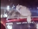 Bengaluru man was seen putting his pet dogs on top of his red-coloured car without any harness or tether. Bengaluru man was seen putting his pet dogs on top of his red-coloured car without any harness or tether.