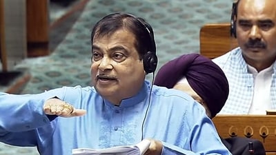 Union Minister of Roads, Transport and Highways Nitin Gadkari speaks in Lok Sabha during the Winter Session of Parliament, in New Delhi Union Minister of Roads, Transport and Highways Nitin Gadkari speaks in Lok Sabha during the Winter Session of Parliament, in New Delhi