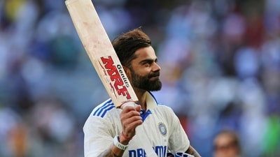 India's Virat Kohli celebrates his century on the third day of the first cricket test between Australia and India in Perth (AP) India's Virat Kohli celebrates his century on the third day of the first cricket test between Australia and India in Perth (AP)