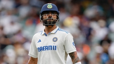 India's Virat Kohli reacts as he walks off the field after losing his wicket during day one of the second cricket test match against Australia (AP) India's Virat Kohli reacts as he walks off the field after losing his wicket during day one of the second cricket test match against Australia (AP)