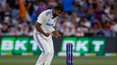India's Jasprit Bumrah celebrates the dismissal of Australia's Usman Khawaja during the day one of the second cricket test match between Australia and India at the Adelaide Oval. (AP) India's Jasprit Bumrah celebrates the dismissal of Australia's Usman Khawaja during the day one of the second cricket test match between Australia and India at the Adelaide Oval. (AP)